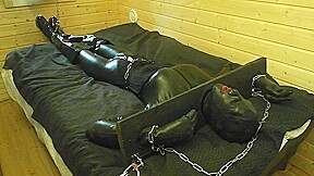 Self bondage pillory latexdoll